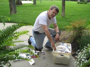 a McKinney Irrigation Repair specialist repairs a drip irrigation line